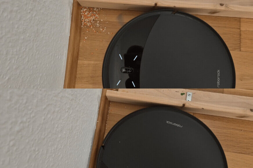 Roborock Saros 10R wischt mit ausgefahrenem Mopp entlang einer Fußleiste